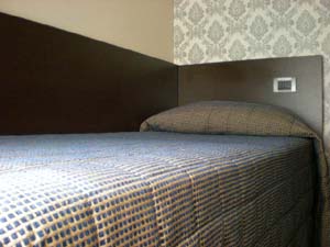 Small single with garden view, and private facilities